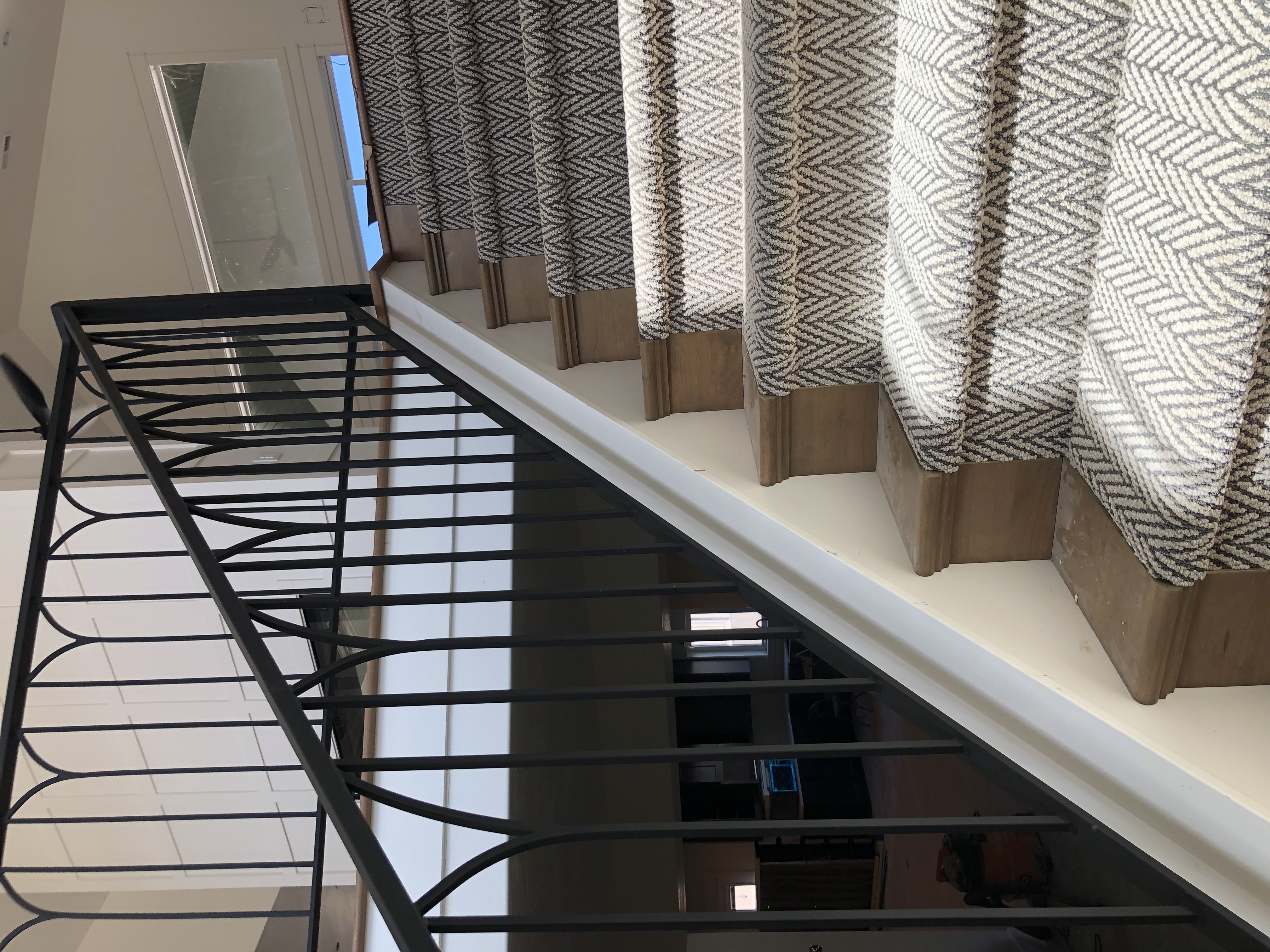 Finished custom steel railing installation demonstrating fabrication quality and precision fit.