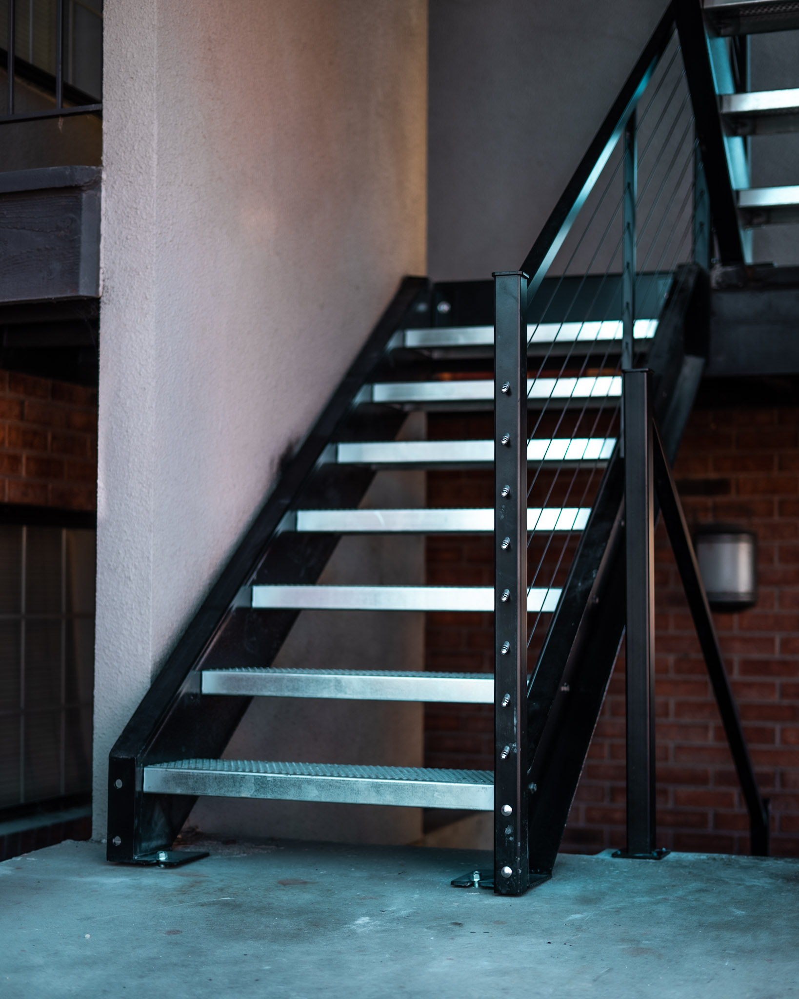 Custom steel stair being installed on a commercial project, showing precision fit and field coordination.