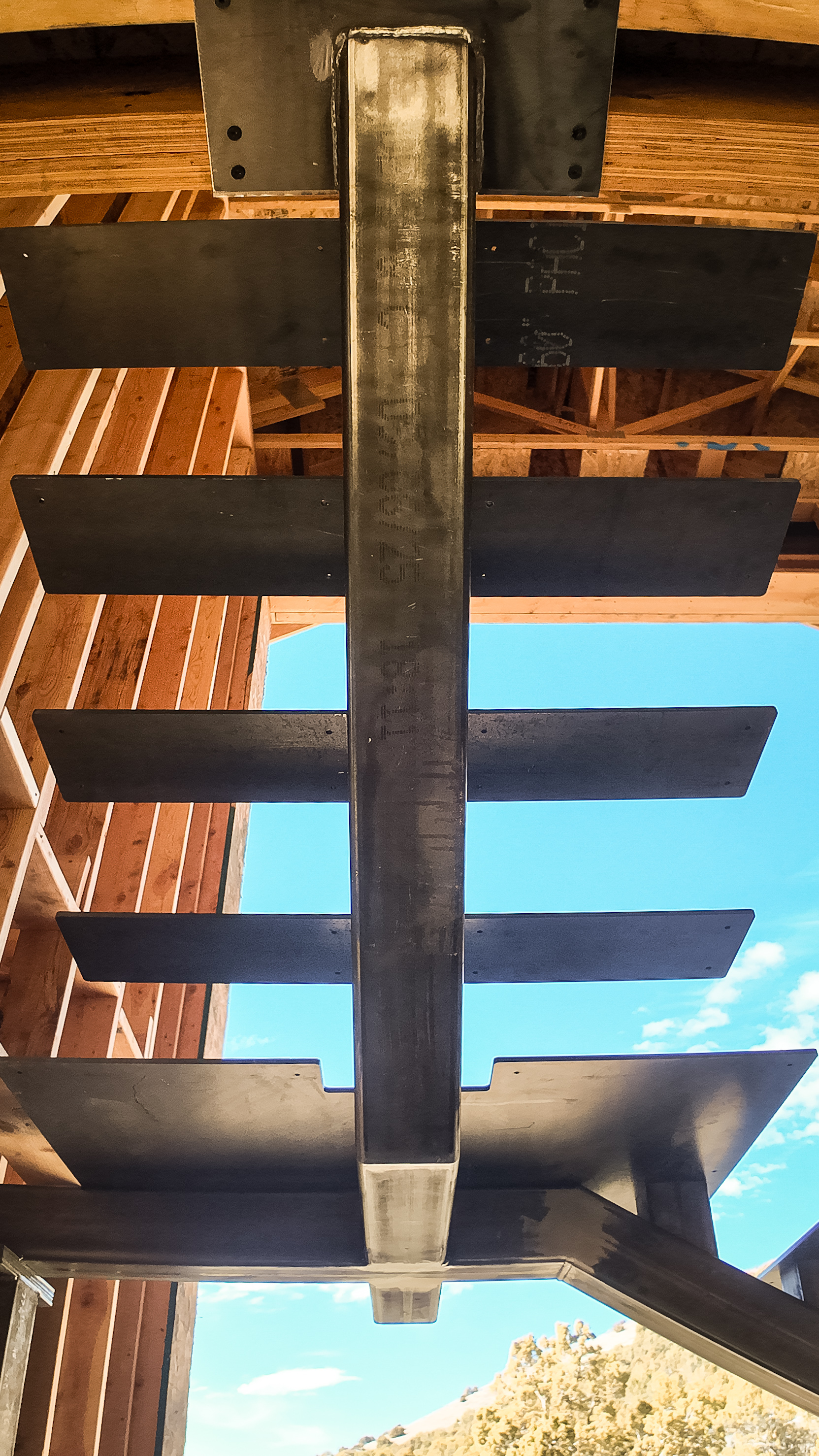 Close-up detail of a fabricated steel stair showing weld quality and connection precision.